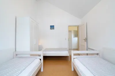 Ein Bett oder Betten in einem Zimmer der Unterkunft Strandpark Sierksdorf H059