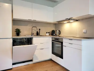 Küche/Küchenzeile in der Unterkunft Charmante Ferienwohnung mit Terrasse - nur 50m zum Strand mit eigenem Parkplatz und Fahrradunterstellmöglichkeit
