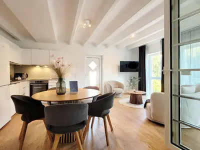 Ein Sitzbereich in der Unterkunft Charmante Ferienwohnung mit Terrasse - nur 50m zum Strand mit eigenem Parkplatz und Fahrradunterstellmöglichkeit