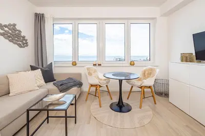 Ein Sitzbereich in der Unterkunft Ostsee Suite 4 - Strandperle