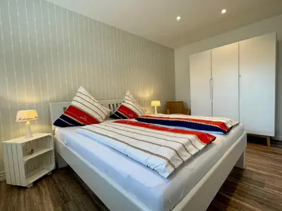 Ein Bett oder Betten in einem Zimmer der Unterkunft Haus Passat