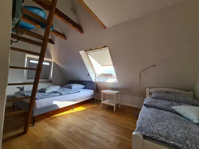Ein Bett oder Betten in einem Zimmer der Unterkunft Haus Sonnenlicht. Idylle am Ratzeburger See!
