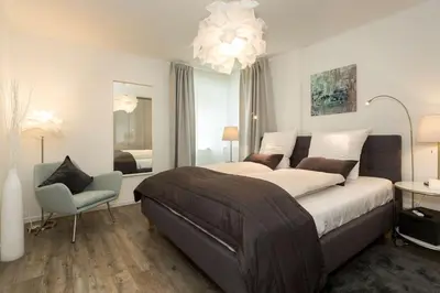 Ein Bett oder Betten in einem Zimmer der Unterkunft MeerGlück Möwenberg 14 Scharbeutz