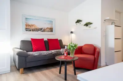 Ein Sitzbereich in der Unterkunft Ostseecamp Lübecker Bucht Casa del Sol mit kostenfreier Saunanutzung