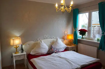 Ein Bett oder Betten in einem Zimmer der Unterkunft Apartment Miesmuschelparadies