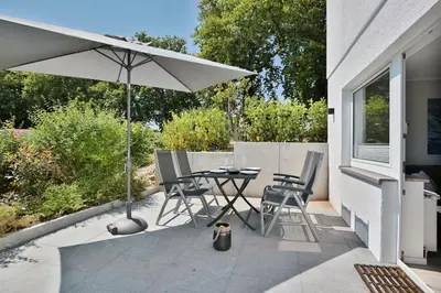 Ein Patio oder anderer Außenbereich in der Unterkunft Haus am Seehof Ferienwohnung Ostseeliebe