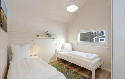 Ein Bett oder Betten in einem Zimmer der Unterkunft Lovely Home In Krems Iiwarderbrück