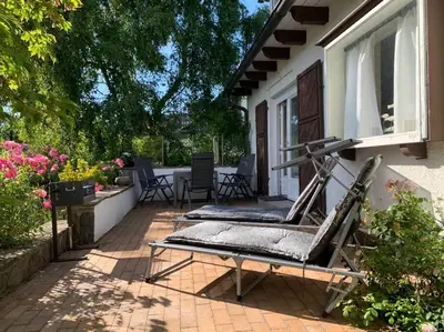 Ein Garten an der Unterkunft Top Lage! Charmantes Landhaus 5 Geh-Min v. Strand