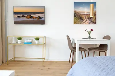 Ein Bett oder Betten in einem Zimmer der Unterkunft Haus Meeresstrand BeachBude Scharbeutz