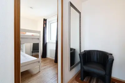 Ein Bett oder Betten in einem Zimmer der Unterkunft Ferienpark Sierksdorf App 461 - Strandlage