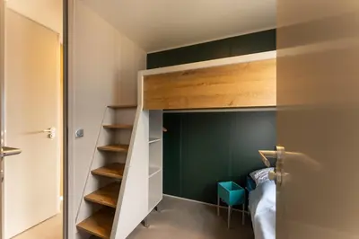 Ein Bett oder Betten in einem Zimmer der Unterkunft Boje 79