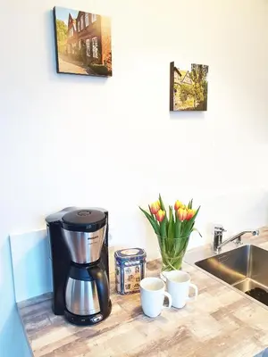 Küche/Küchenzeile in der Unterkunft Ferienwohnung Trave - Wohlfühlatmosphäre zum Auftanken