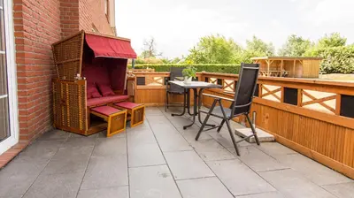 Ein Balkon oder eine Terrasse in der Unterkunft Die Ostseeperle mit Pool