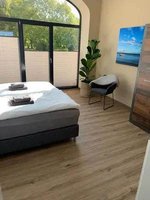 Ein Bett oder Betten in einem Zimmer der Unterkunft Ferienwohnung 2 am Herrenhaus Ahrensbök