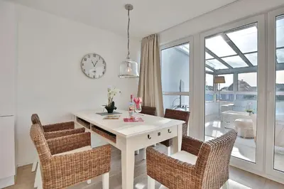 Ein Sitzbereich in der Unterkunft Haus Seesand Penthouse Wohlfühlzeit