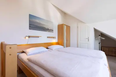 Ein Bett oder Betten in einem Zimmer der Unterkunft ARW3b Ferienwohnung Walden F