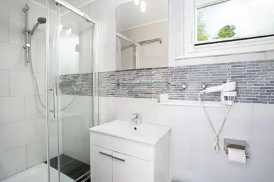 Ein Badezimmer in der Unterkunft ERL12 Ferienhaus Niendorf Ostsee