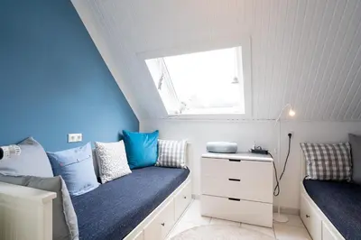 Ein Bett oder Betten in einem Zimmer der Unterkunft HER16c Ankes Gästehaus F