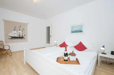 Ein Bett oder Betten in einem Zimmer der Unterkunft MEI77 Ferienwohnung Zimmermann F