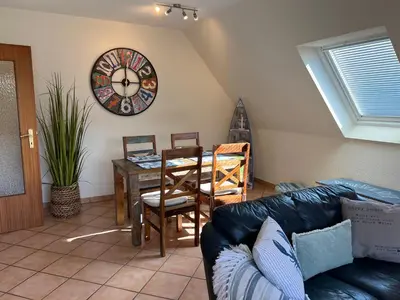 Ein Sitzbereich in der Unterkunft STOE12a Ferienhaus Sonne, Wohnung Sonnenaufgang