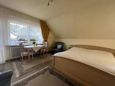 Ein Bett oder Betten in einem Zimmer der Unterkunft STOE 14b Gästehaus Iden, App 2