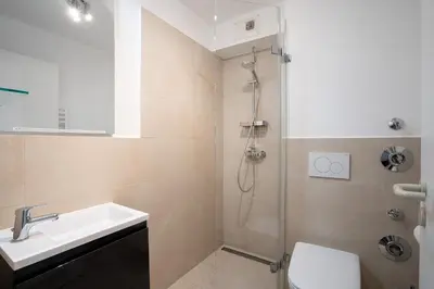 Ein Badezimmer in der Unterkunft STR123d Ferienwohnung 
