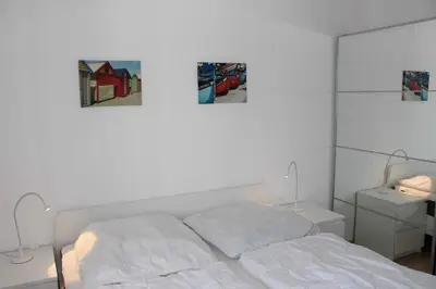Ein Bett oder Betten in einem Zimmer der Unterkunft STR123f Ferienwohnung Braun