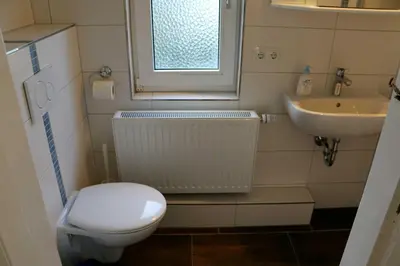 Ein Badezimmer in der Unterkunft STR81b Ferienwohnungen Steinmetz - Landseite
