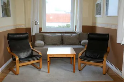 Ein Sitzbereich in der Unterkunft STR81b Ferienwohnungen Steinmetz - Landseite
