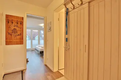 Ein Bett oder Betten in einem Zimmer der Unterkunft Strandduene Stranddüne Appartement 23