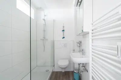 Ein Badezimmer in der Unterkunft Ferienwohnung Capolino Suite