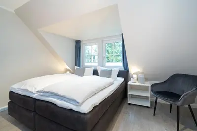 Ein Bett oder Betten in einem Zimmer der Unterkunft Ferienwohnung Hygge