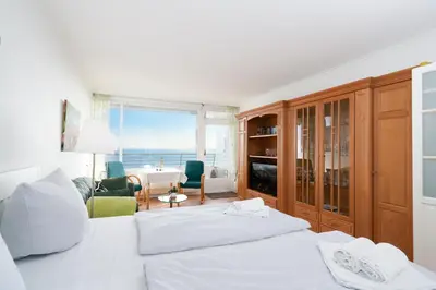 Ein Bett oder Betten in einem Zimmer der Unterkunft Ferienwohnung Meerblick App 805