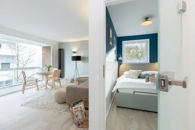 Ein Bett oder Betten in einem Zimmer der Unterkunft Ferienwohnung Maria