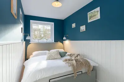 Ein Bett oder Betten in einem Zimmer der Unterkunft Ferienwohnung Maria