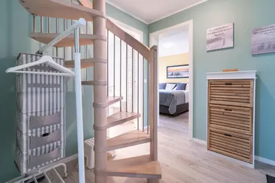 Ein Bett oder Betten in einem Zimmer der Unterkunft Ferienwohnung SuiteBEACH