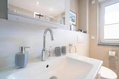 Ein Badezimmer in der Unterkunft Ferienwohnung SuiteBEACH