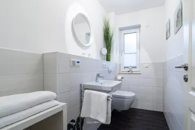 Ein Badezimmer in der Unterkunft Strandhaus Möwenberg App 11