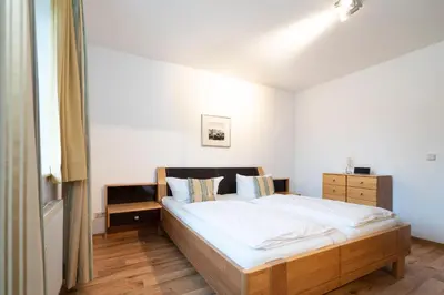 Ein Bett oder Betten in einem Zimmer der Unterkunft Wohnpark am Mühlenteich - Appartement 30