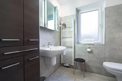 Ein Badezimmer in der Unterkunft Wohnpark am Mühlenteich - Appartement 30