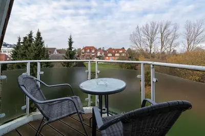 Ein Balkon oder eine Terrasse in der Unterkunft Wohnpark am Mühlenteich - Appartement 38