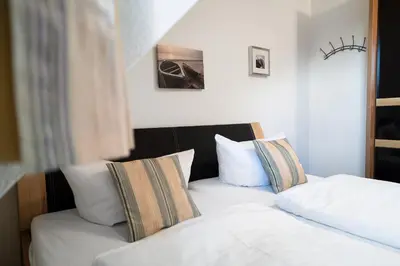 Ein Bett oder Betten in einem Zimmer der Unterkunft Wohnpark am Mühlenteich - Appartement 39