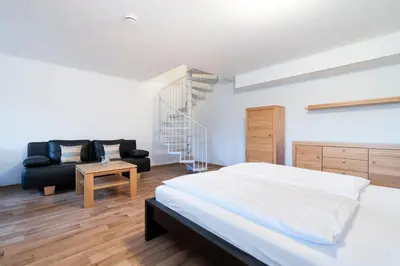 Ein Bett oder Betten in einem Zimmer der Unterkunft Wohnpark am Mühlenteich - Appartement 28