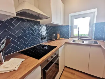 Küche/Küchenzeile in der Unterkunft Ferienhaus Urban Fewo Alte Backstube 2-4 Personen WLAN gegenüber vom Strand