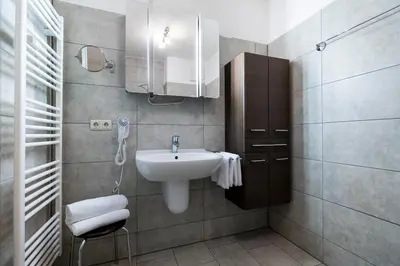 Ein Badezimmer in der Unterkunft Wohnpark am Mühlenteich - Appartement 36