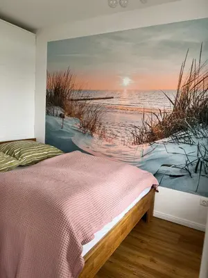 Ein Bett oder Betten in einem Zimmer der Unterkunft Ostsee Ferienwohnung in Sierksdorf - Hansa Park