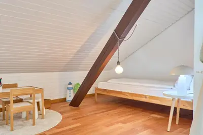 Ein Bett oder Betten in einem Zimmer der Unterkunft Haus Falkenweg 5 Ferienhaus Falkenweg