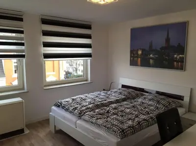 Ein Bett oder Betten in einem Zimmer der Unterkunft Cozy apartment in Luebeck!