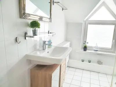 Ein Badezimmer in der Unterkunft Ferienwohnung Stadtvilla - charmante Gemütlichkeit