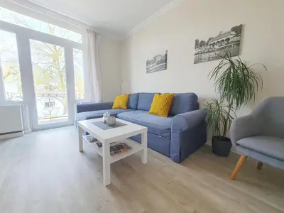 Ein Sitzbereich in der Unterkunft Ferienwohnung Stadtvilla - charmante Gemütlichkeit